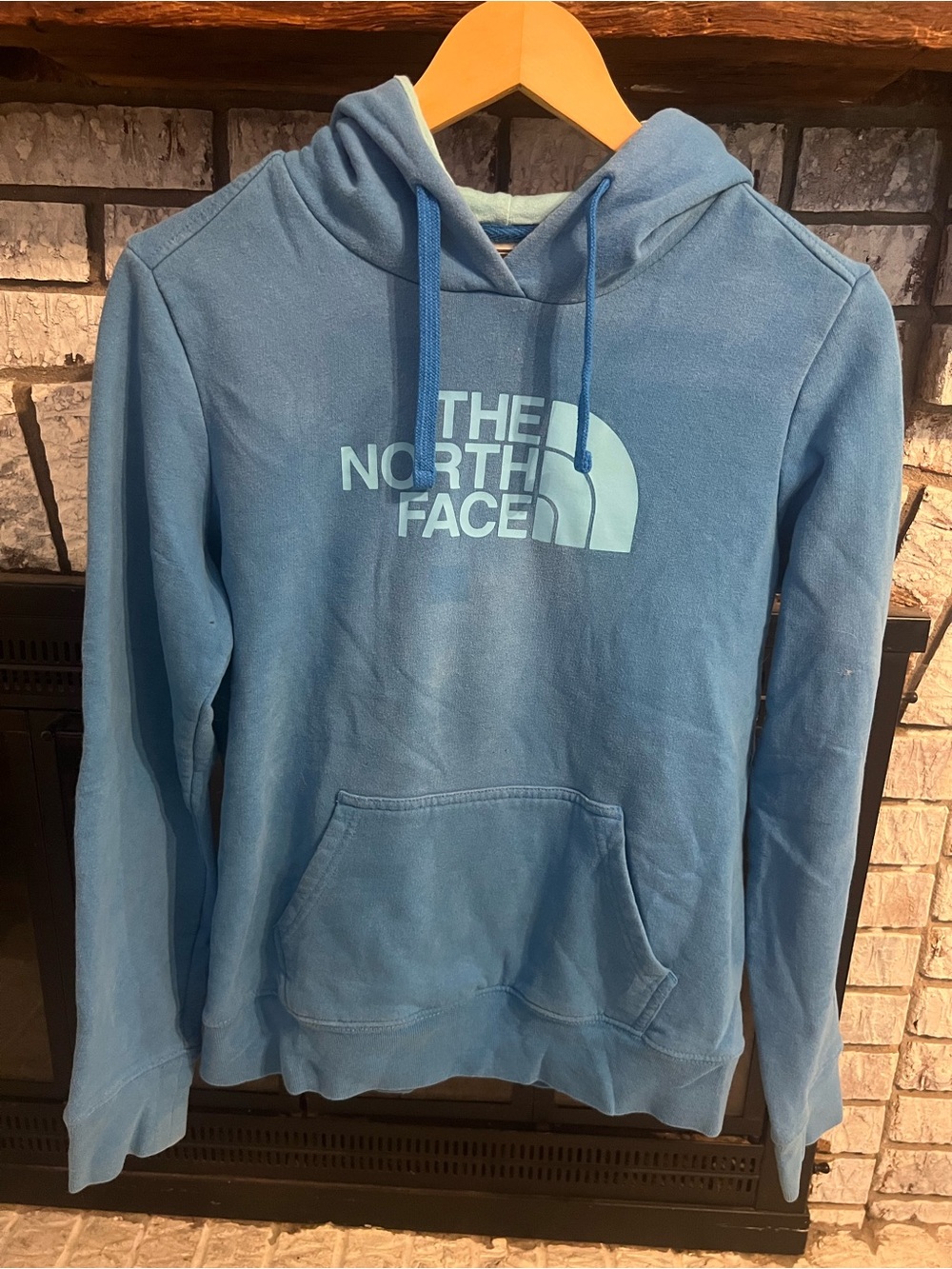 The North Face Light Blue Pullover Hoodie with Logo